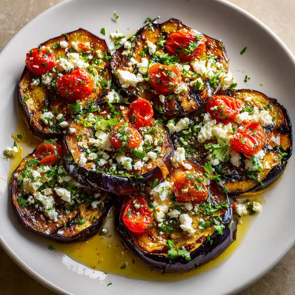 A beautiful serving of Mediterranean roasted eggplant in a white bowl, showing the tender inside of the vegetable.