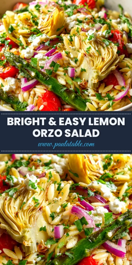 An overhead shot of a large white bowl filled with Orzo Salad with Asparagus, lemon slices, and fresh dill, ready to be served.