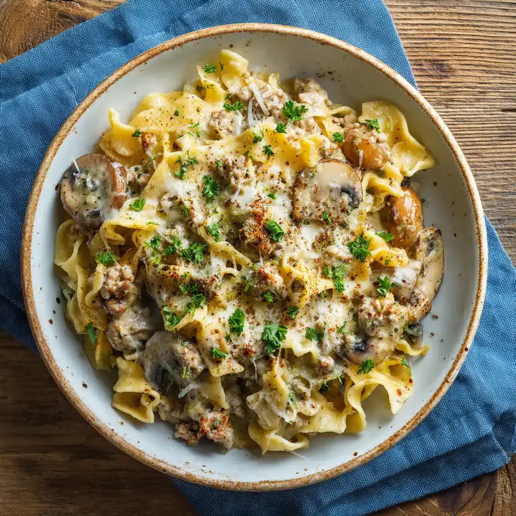 Detailed view of perfectly seared mushrooms and ground turkey enveloped in stroganoff sauce.