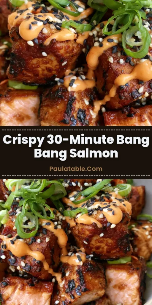 A shallow ceramic bowl filled with Crispy Bang Bang Salmon Bites, featuring a charred golden exterior, zigzag spicy orange sauce, sesame seeds, and green onions.