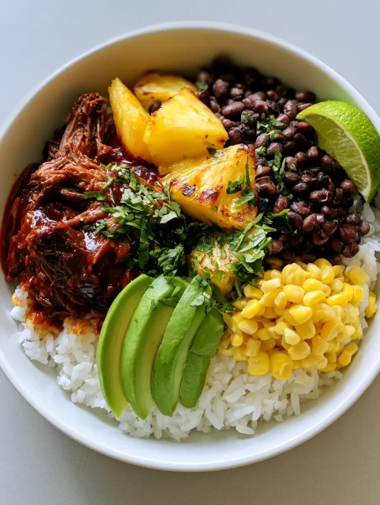 Chipotle Pineapple Pot Roast: The Ultimate Sweet and Smoky Slow Cooker Meal 1 Close-up of shredded beef pot roast glistening in chipotle sauce next to fresh avocado and black beans. (Chipotle Pineapple Pot Roast)